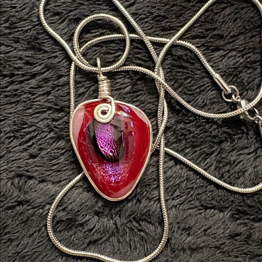 Handmade Red Glass Oval Pendant with Dichroic Glass inside
Wrapped in Silver 925